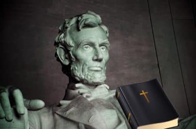 Abe Lincoln statue with the BIble