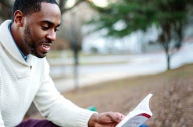 man reading a book